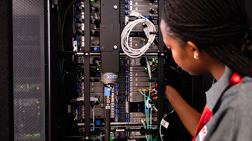 Image of Marist student working with IBM’s z17 mainframe.