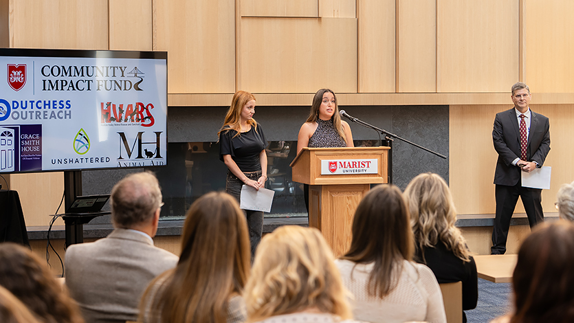 Image of Autumn Massa ‘29 and Samantha Gormley ’27 address the crowd at the Community Impact Fund launch. Photo by Nelson Echeverria/Marist University.&nbsp;