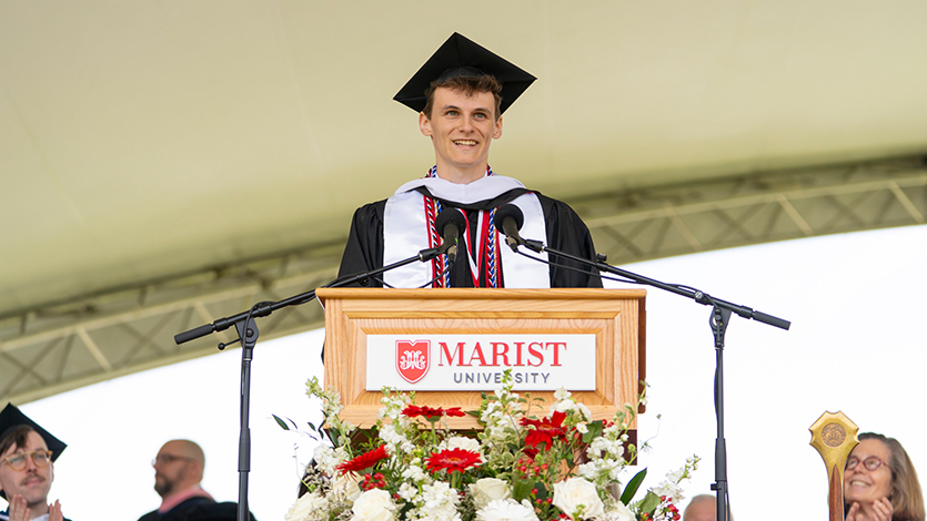 Image of Student speaker Hugo Gizzi addressing his fellow graduate.