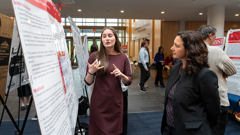 Image of Dr. Carol Rinke with a student at CURSCA.
