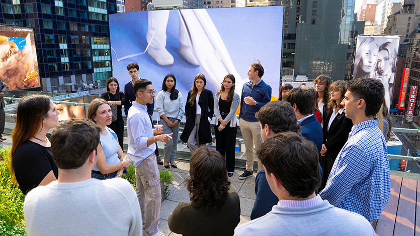 Image of students on tour of Paramount offices in Times Square.