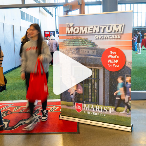 Image of the momentum showcase with play icon.