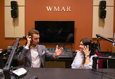 Marist University image: William and a colleague in the WMAR studio.