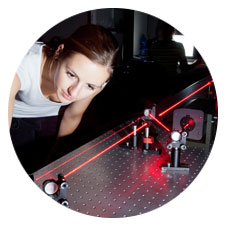 Image of a student working in a physics lab.