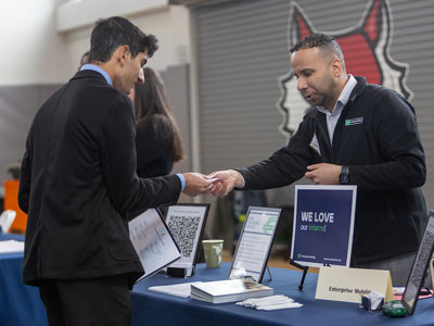 Image of a Marist University student at a career and internship fair.