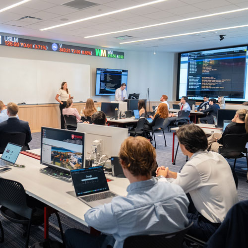 Image of the Marist University of a student presentation in the Investment Center.