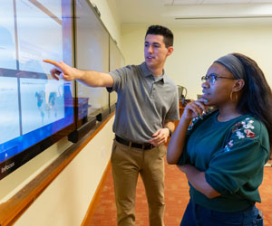 Image of Marist University students collaborating in the Cybersecurity Operations Center.