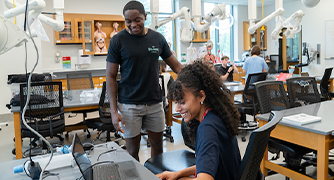 image of two students in science classroom