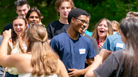 Image of students engaged in an icebreaker.