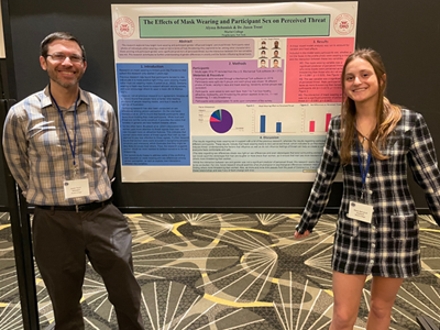 Image of student and faculty member presenting research at the Eastern Psychological Association.