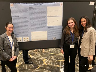 Image of student and faculty member presenting research at the Eastern Psychological Association.