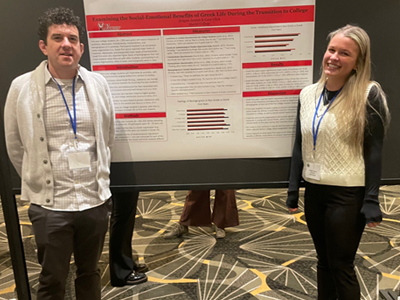 Image of student and faculty member presenting research at the Eastern Psychological Association.