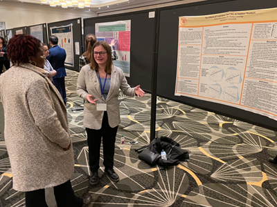 Image of student and faculty member presenting research at the Eastern Psychological Association.