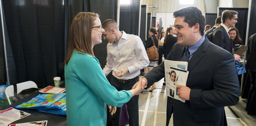 Photo of student and employer shaking hands